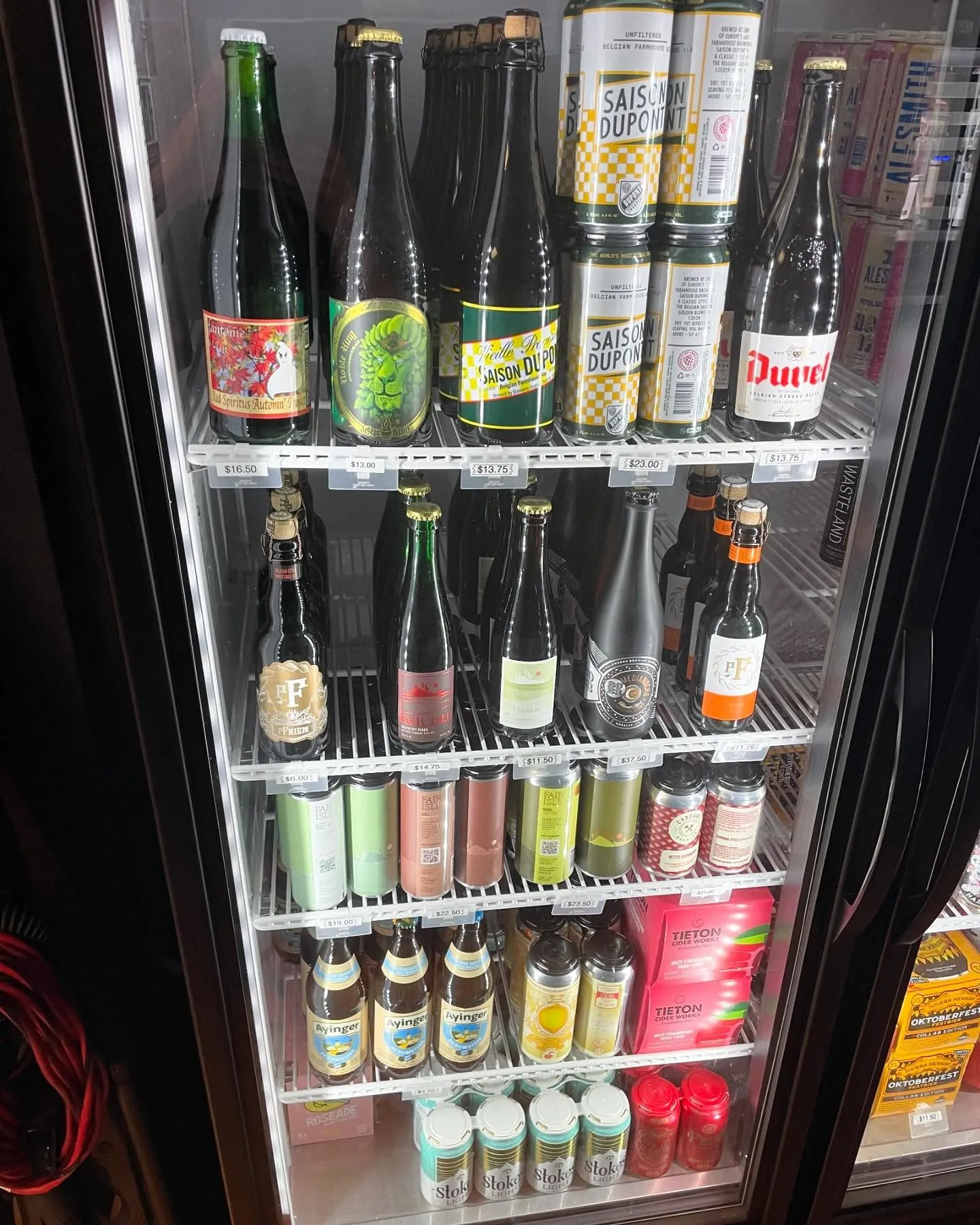 The to-go cooler stocked with Saison Dupont, Duvel, pFriem, Ayinger and Tieton cider